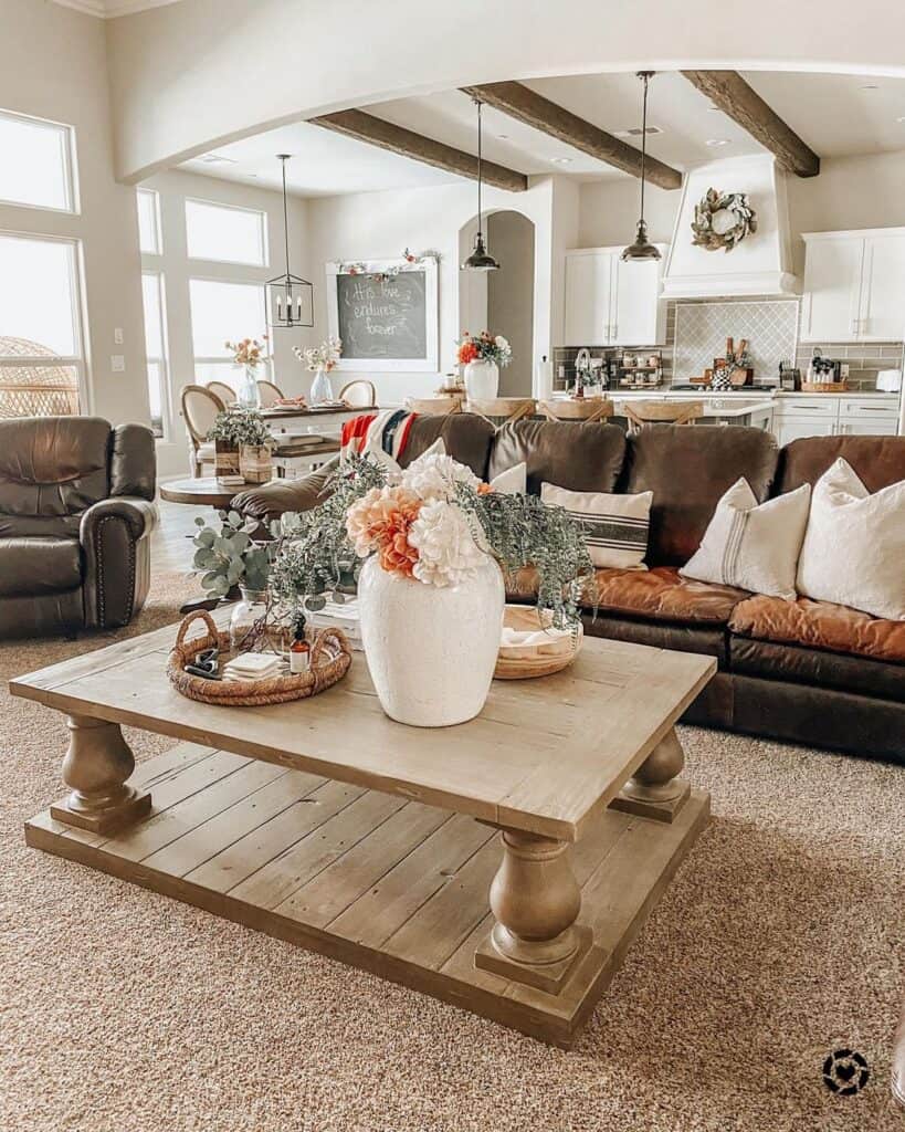 Agreeable Gray Farmhouse Living Room with Brown Couch