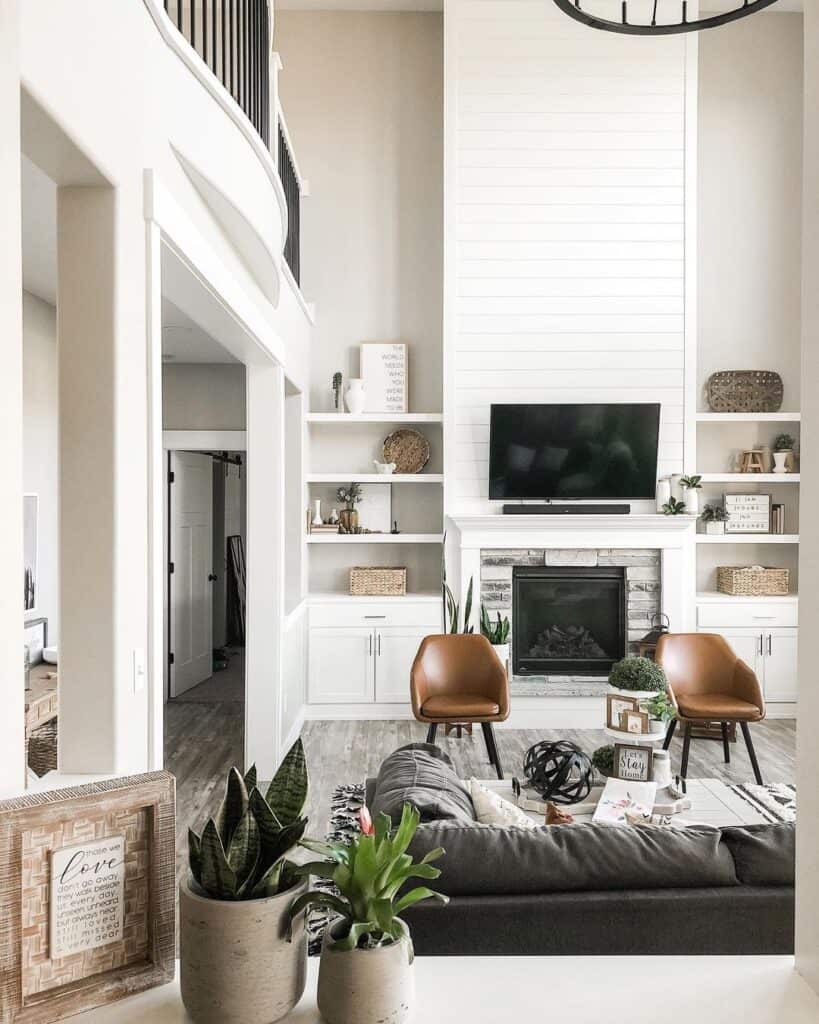 living room with shiplap fireplace