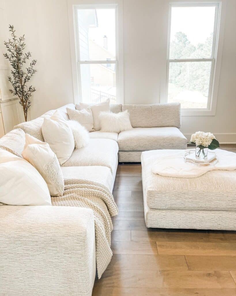 White Sectional Sofa with Matching Ottoman