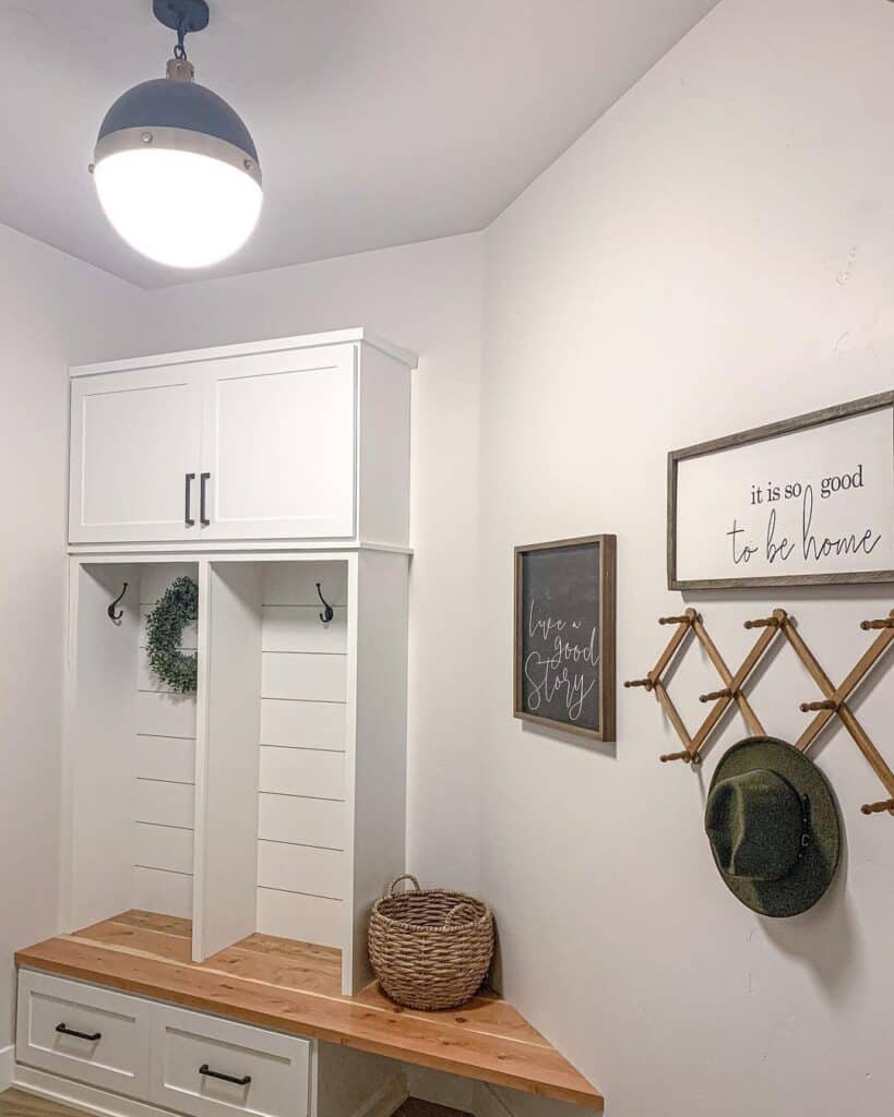 White Built-in Cabinets with Wood Mudroom Bench