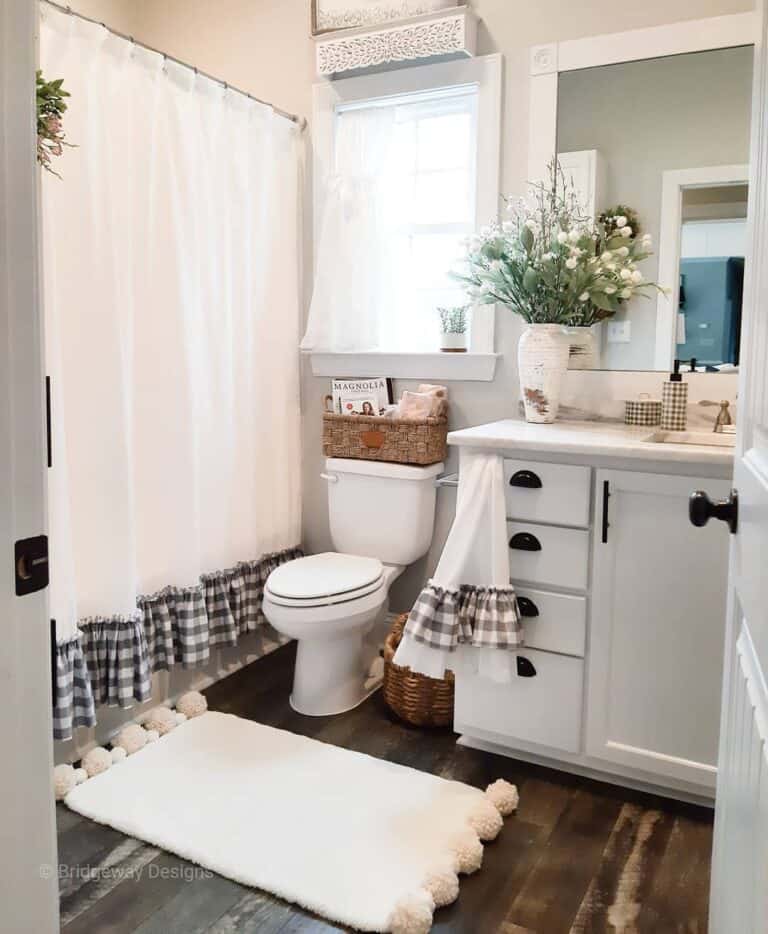 Bathtub with White and Gray Gingham Shower Curtain