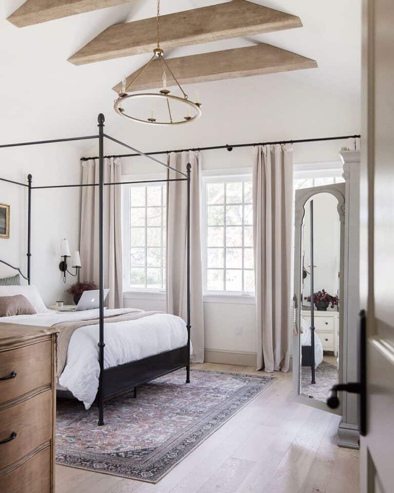 Bedroom with White Vaulted Ceiling
