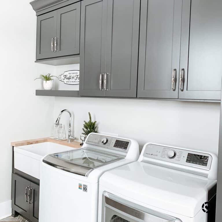 Gray Cabinets in Small Laundry Room with Sink