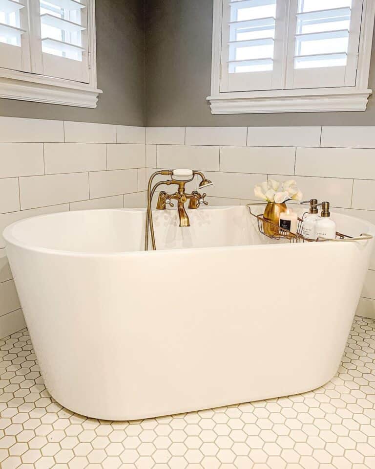 Brass Bath Caddy on Oval Freestanding Tub