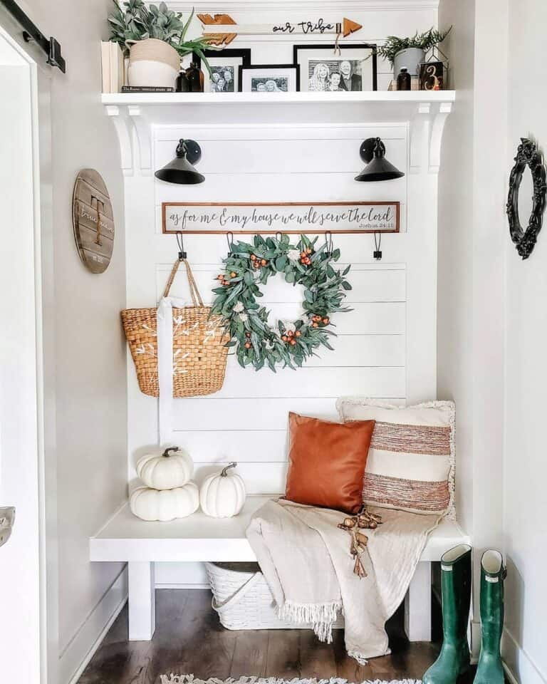 White Shiplap Mudroom with Brown Fabric and Leather Throw Pillows