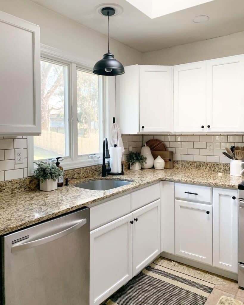 Subway Tile Backsplash with Granite Countertops of Beige and Brown