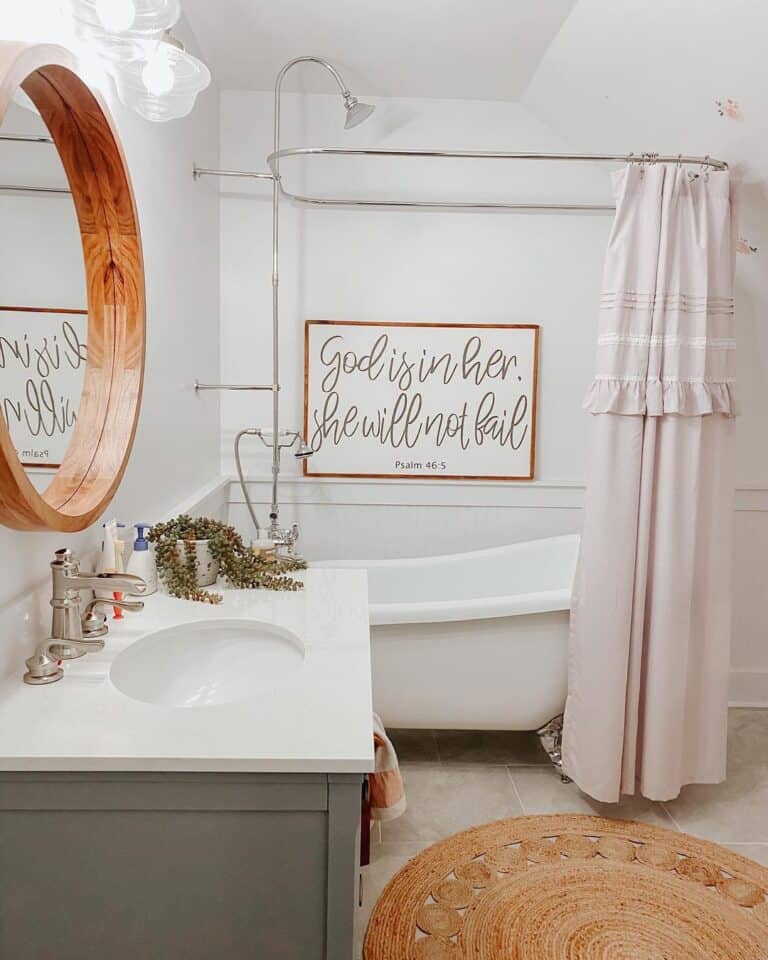 Claw Foot Tub with Light Pink Shower Curtain