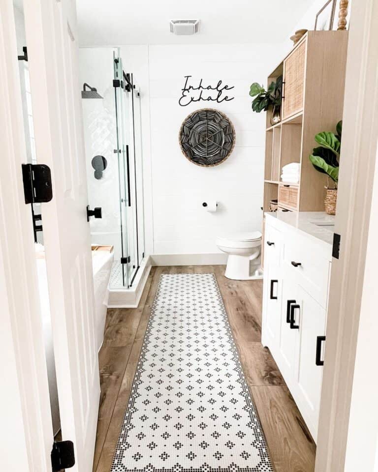 Glass and Black Hardware Shower Next to Toilet