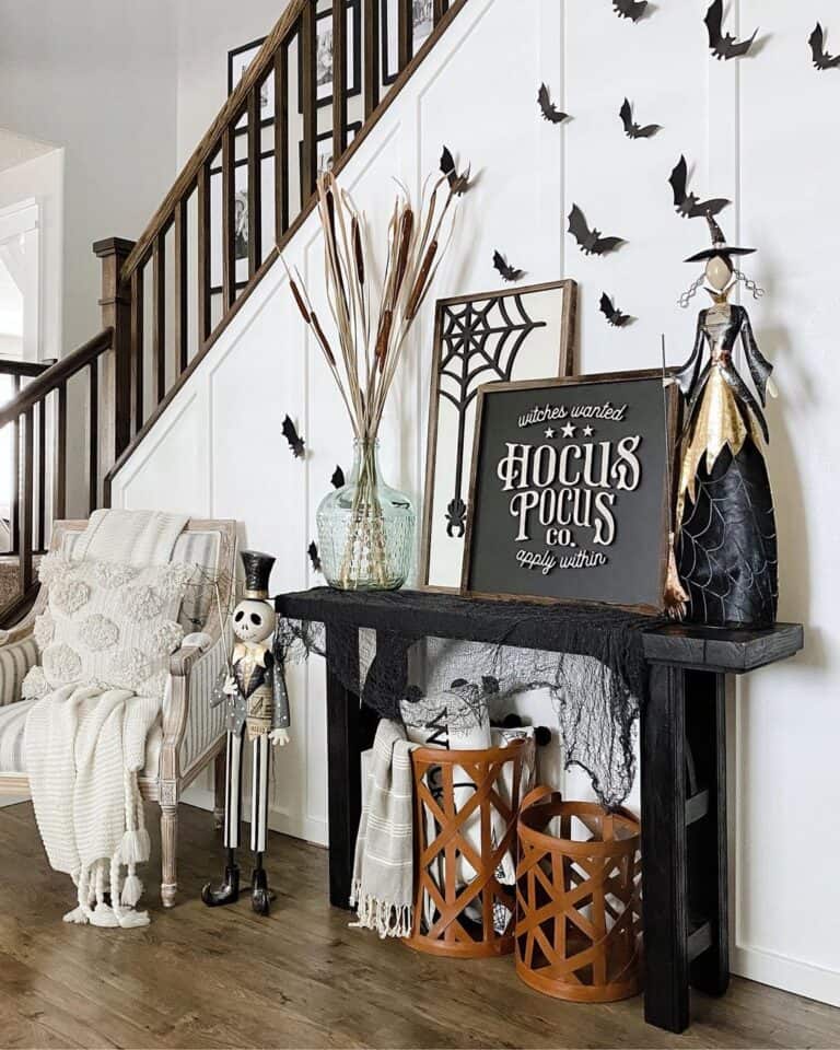 Black Console Table with Witch Bobble Statue