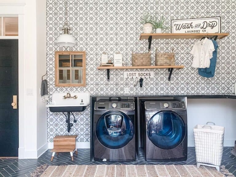 Laundry Room with Black Herringbone Flooring