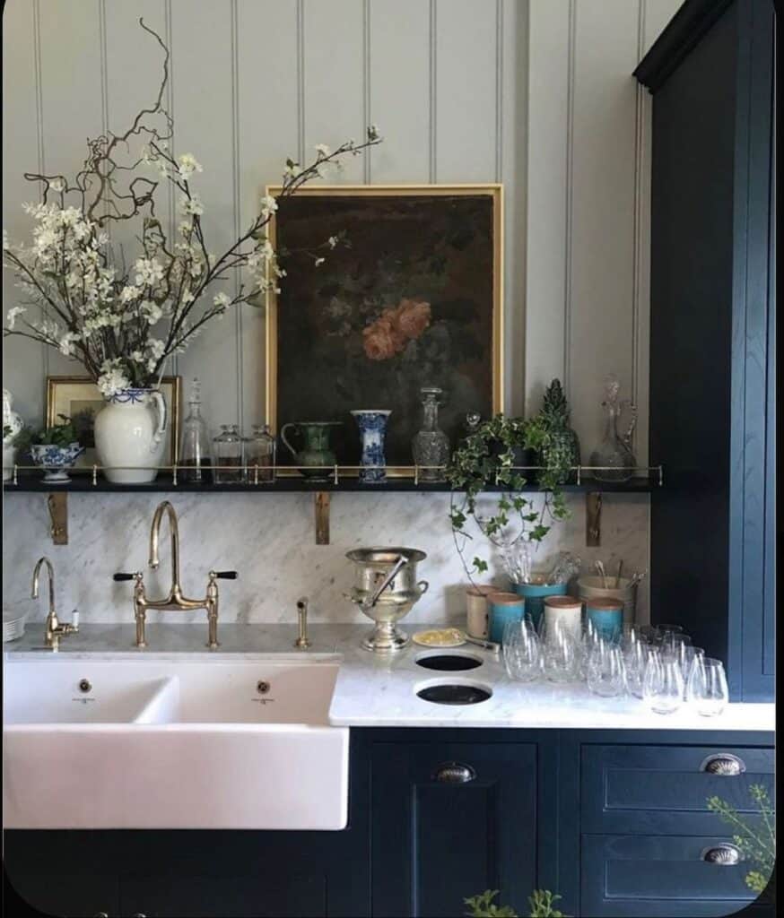 Navy Cabinets with White Apron Sink