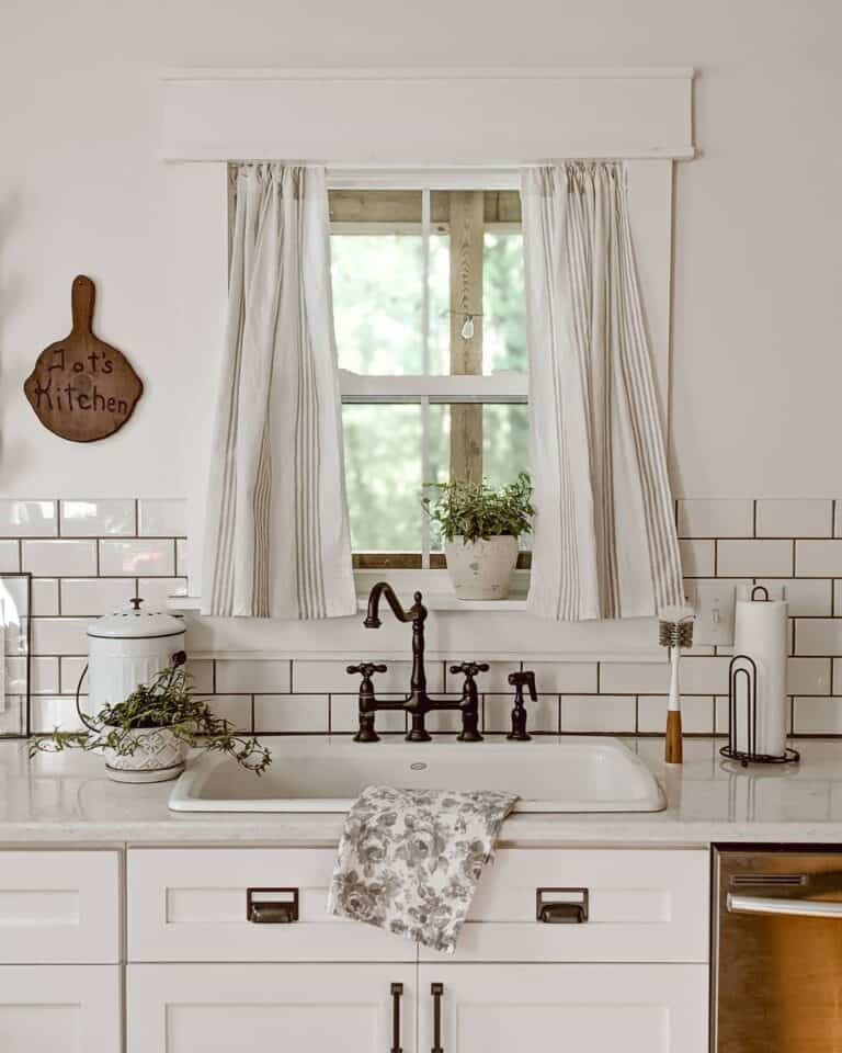 Off-white and Gray Curtain Above Kitchen Sink