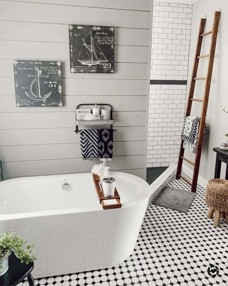 Oval Tub on White and Black Floor Tiles