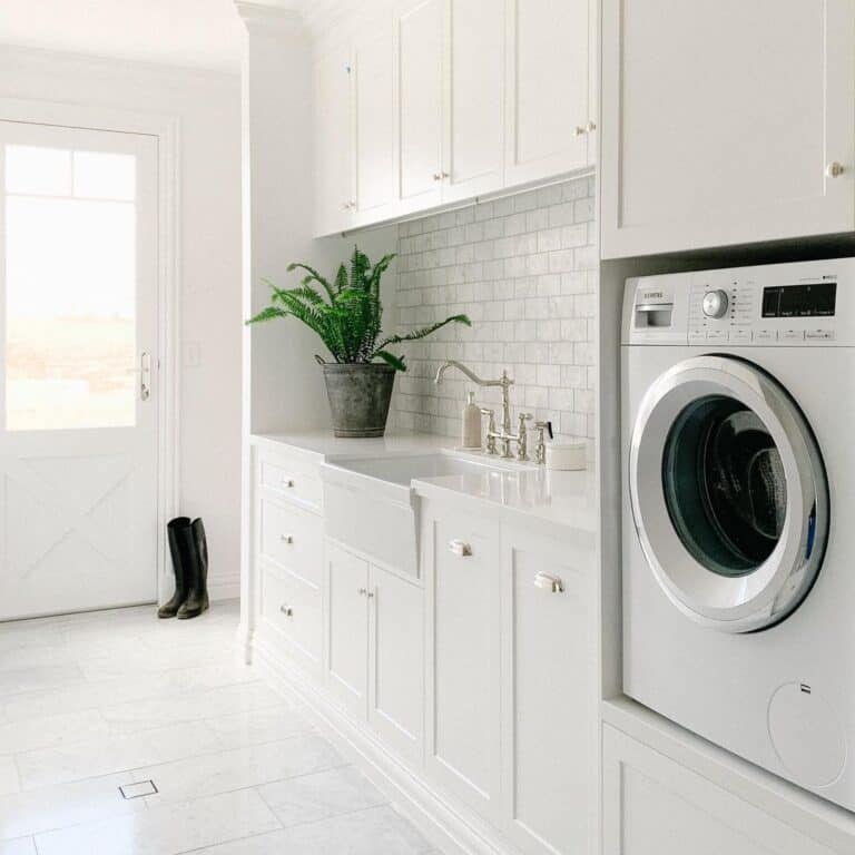 White Apron Sink with Gray Tile Backsplash