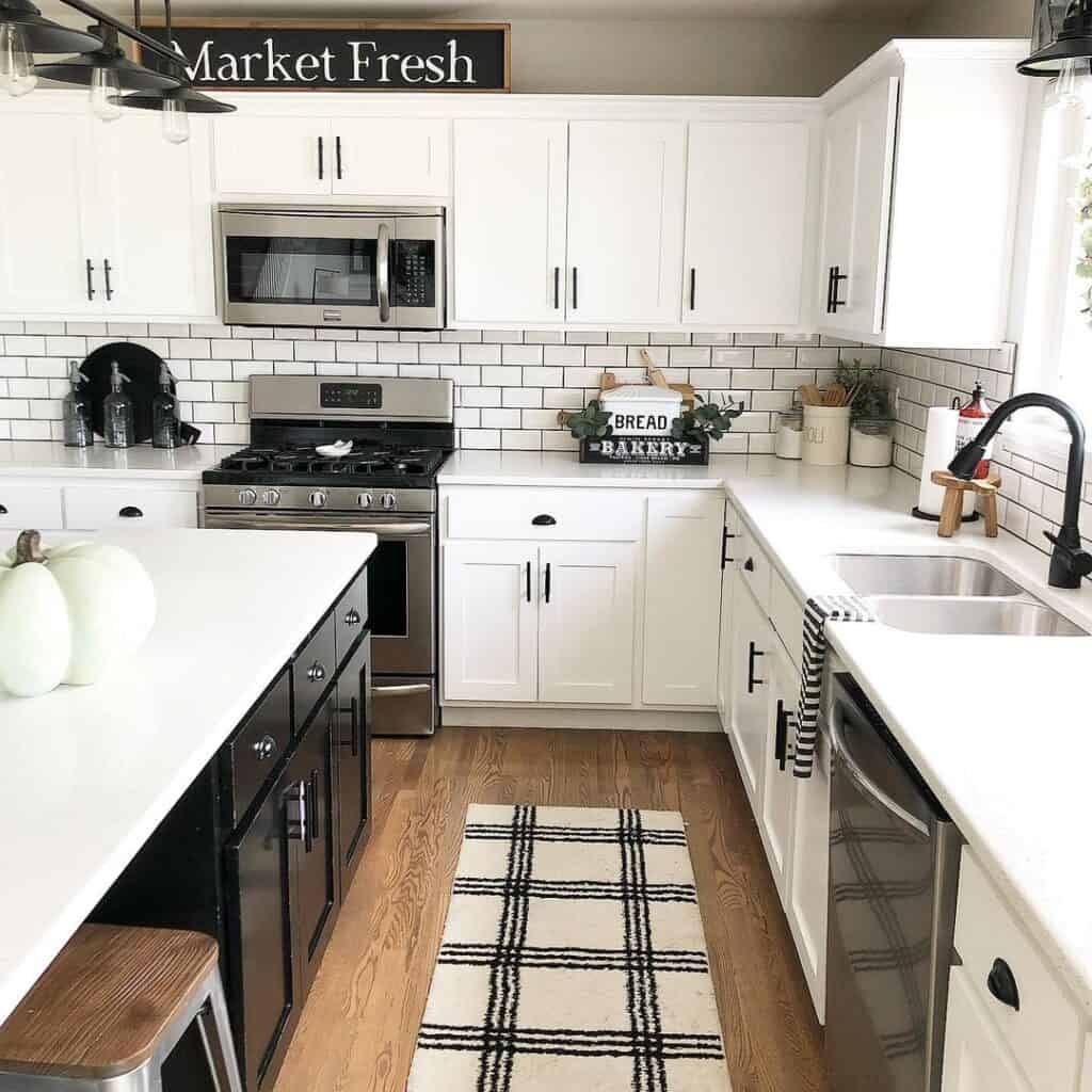 White Farmhouse Kitchen With Black Contrasting Island - Soul & Lane