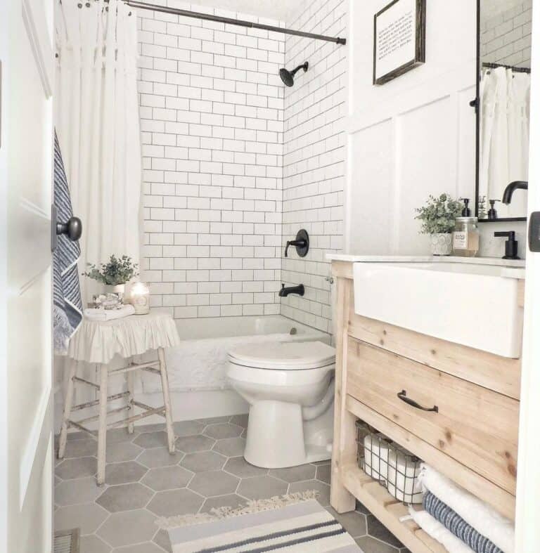 White Drop-in Bathtub with Black Shower Kit