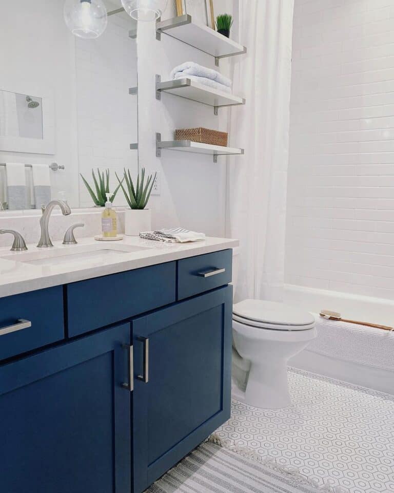 White Drop-in Tub Next to White Toilet