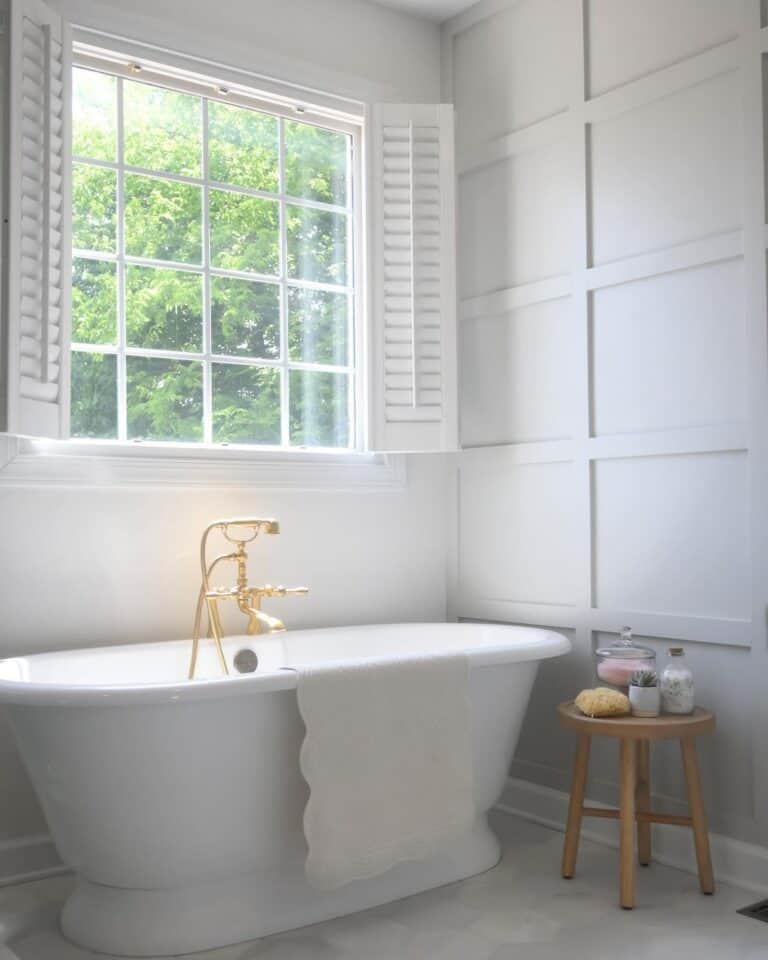 Farmhouse Bathroom with White Window Shutters