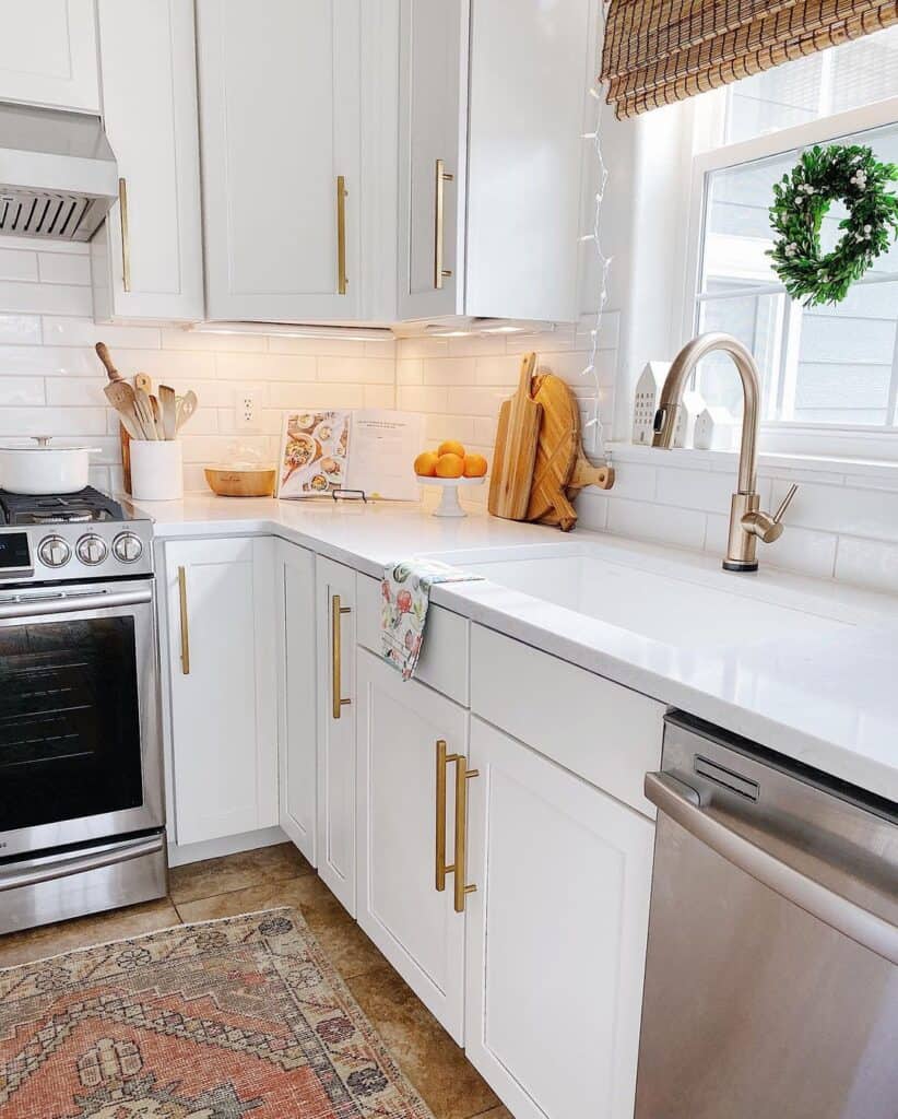White Kitchen Cabinets with Brass Pulls