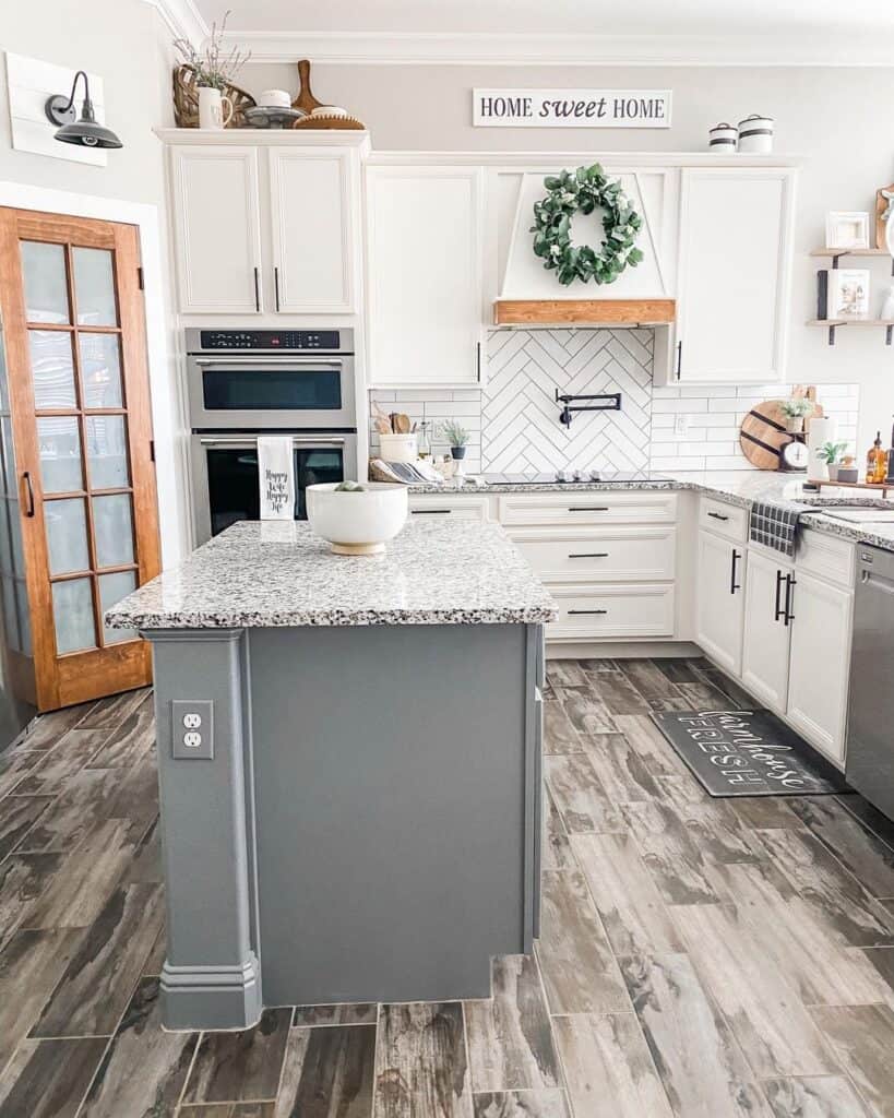 White Kitchen with Contrasting Gray Island