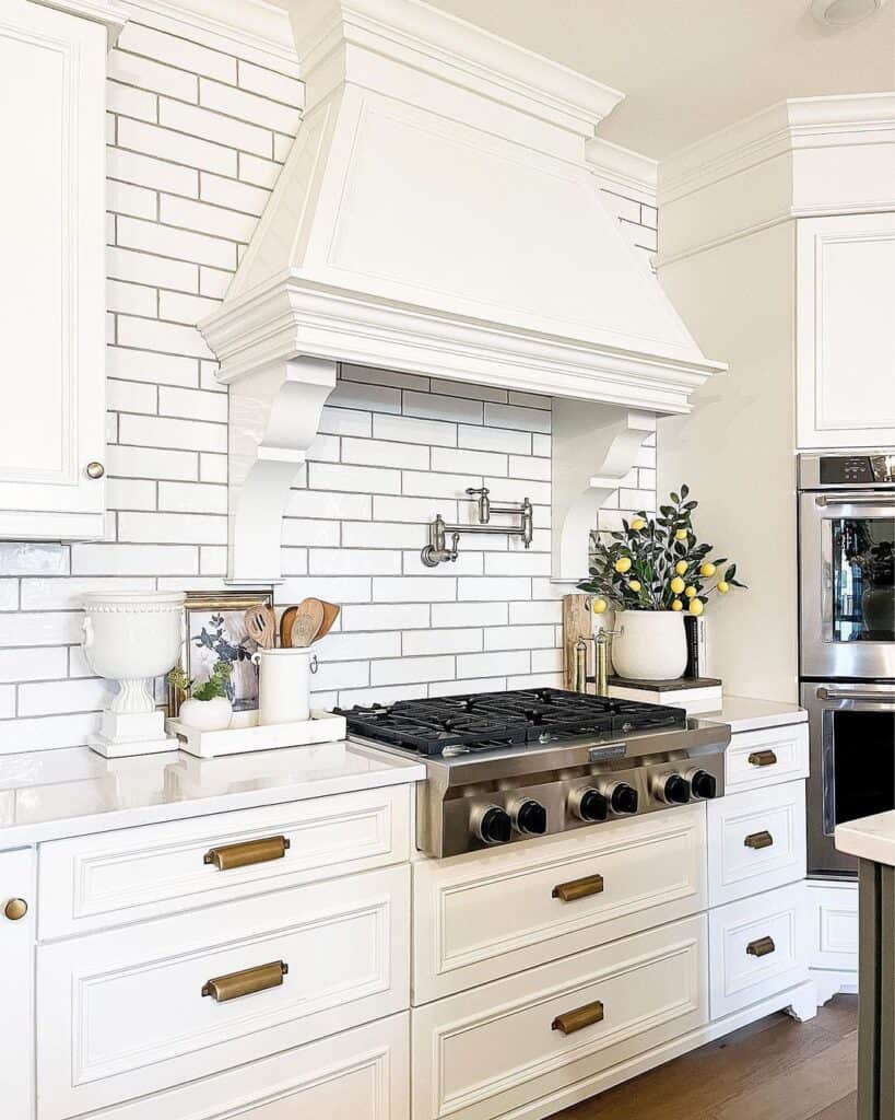 White Kitchen with Stainless Steel Appliances