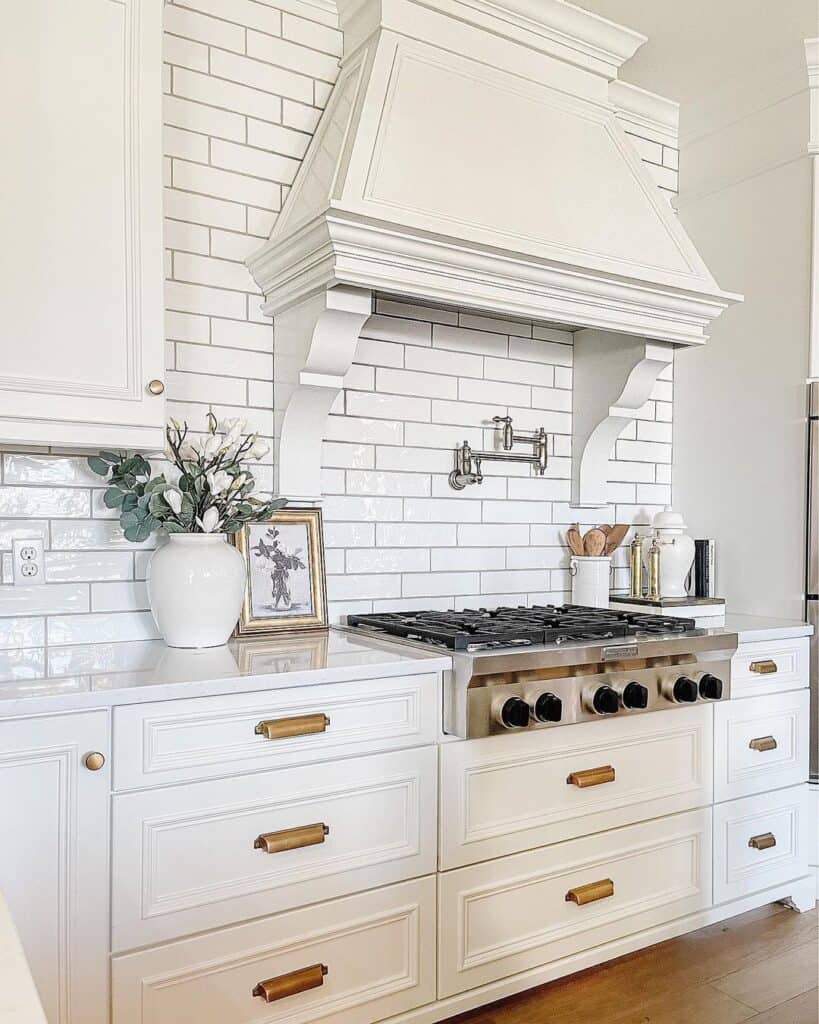 White Kitchen with Stainless Steel Gas Stove