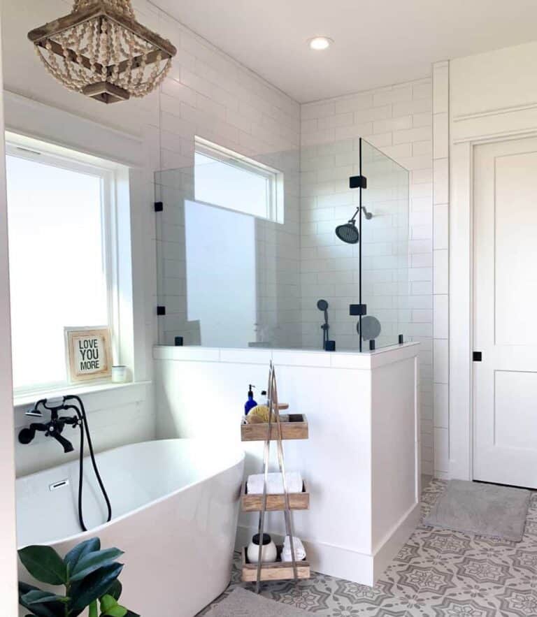 White Oval Tub Next to Walk-in Shower