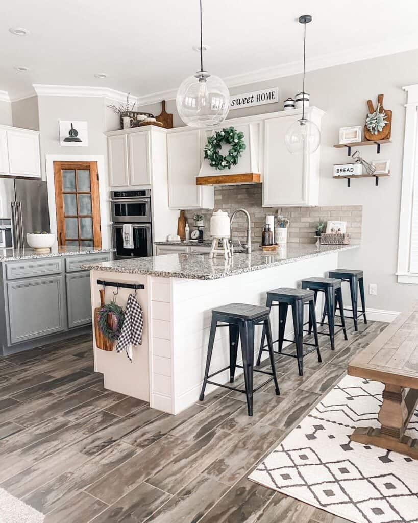 White Shiplap Kitchen Peninsula with Black Stools