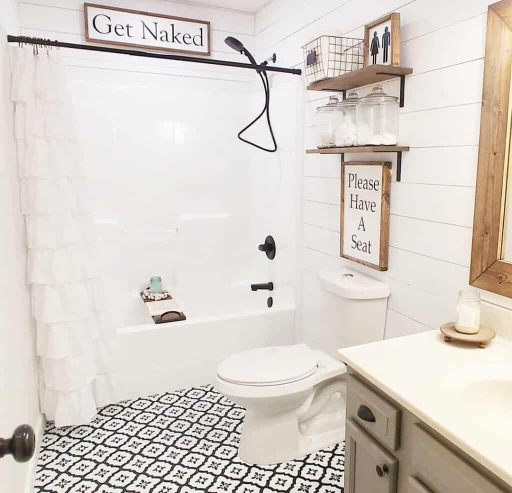 Farmhouse Bathroom with White Tub and Shower