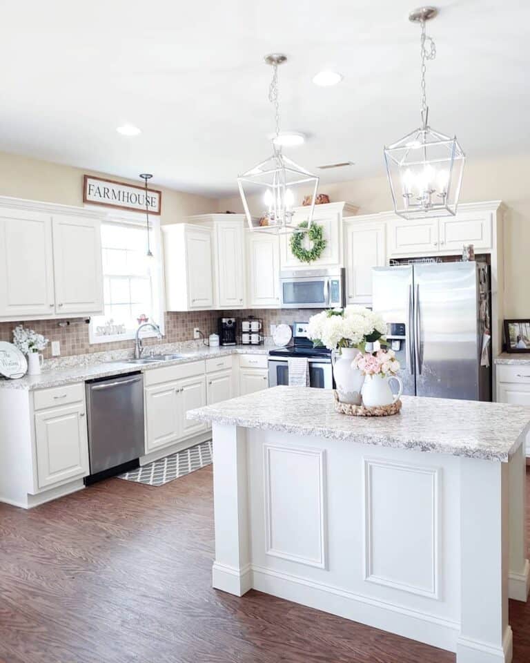 White kitchen Island with Decorative Molding