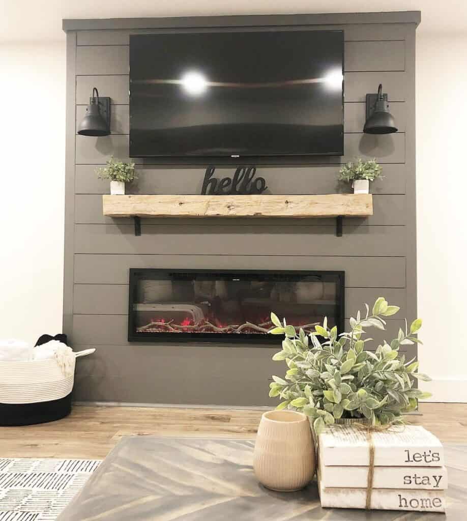 Fireplace Mantel Lighting on Gray Shiplap Wall