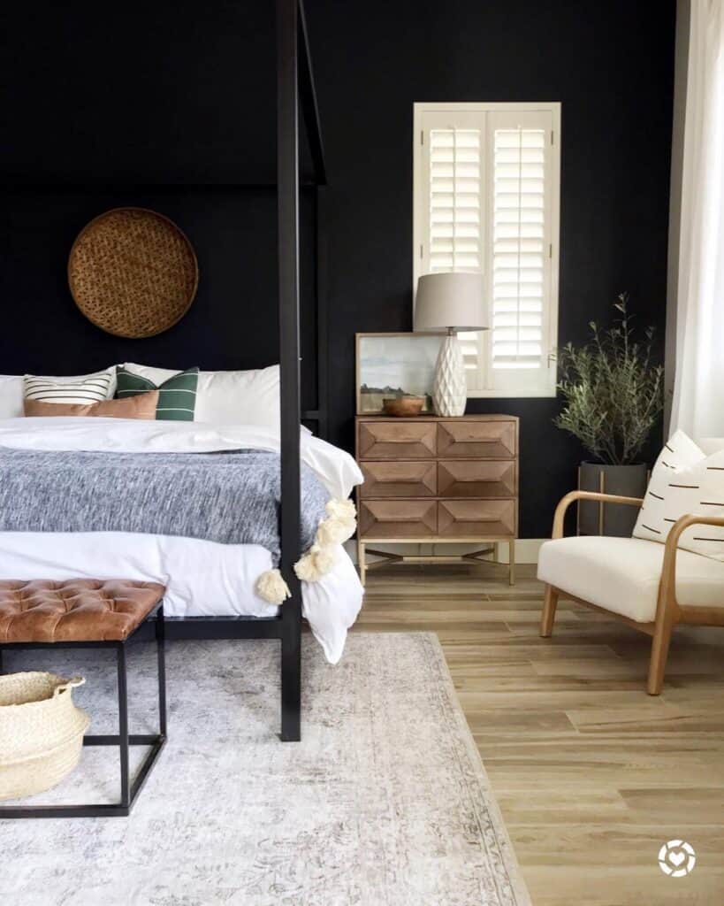 Black Bedroom with White and Wood Armchair