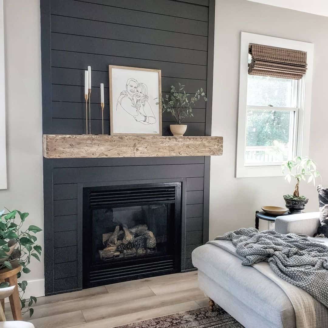 Black Shiplap Fireplace with Portrait Art Piece Soul & Lane