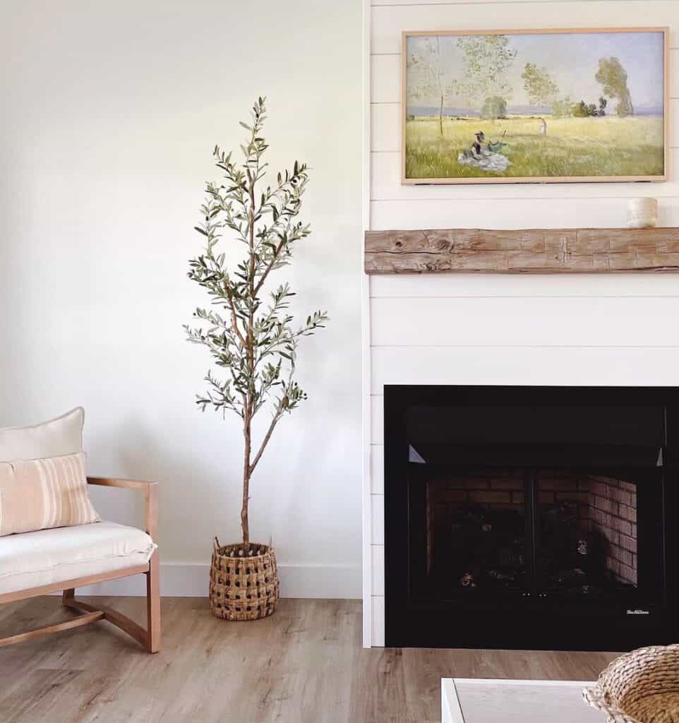 Blue and Green Art Above Hand Hewn Wood Mantel