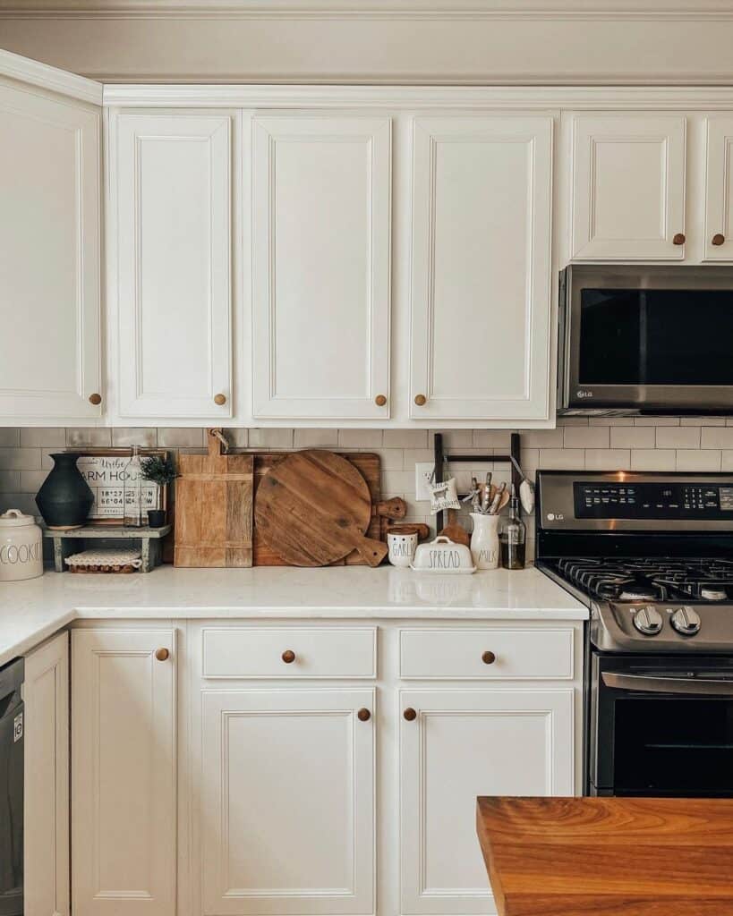 Brass Knobs on White Kitchen Cabinets