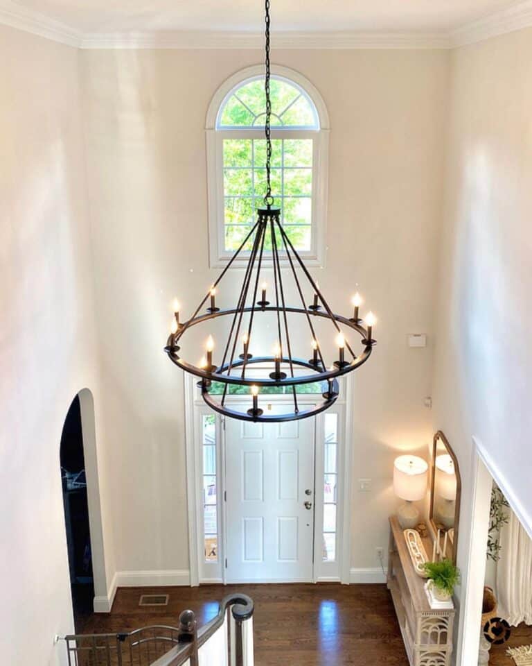 Foyer with Two Tier Black Wagon Wheel Chandelier