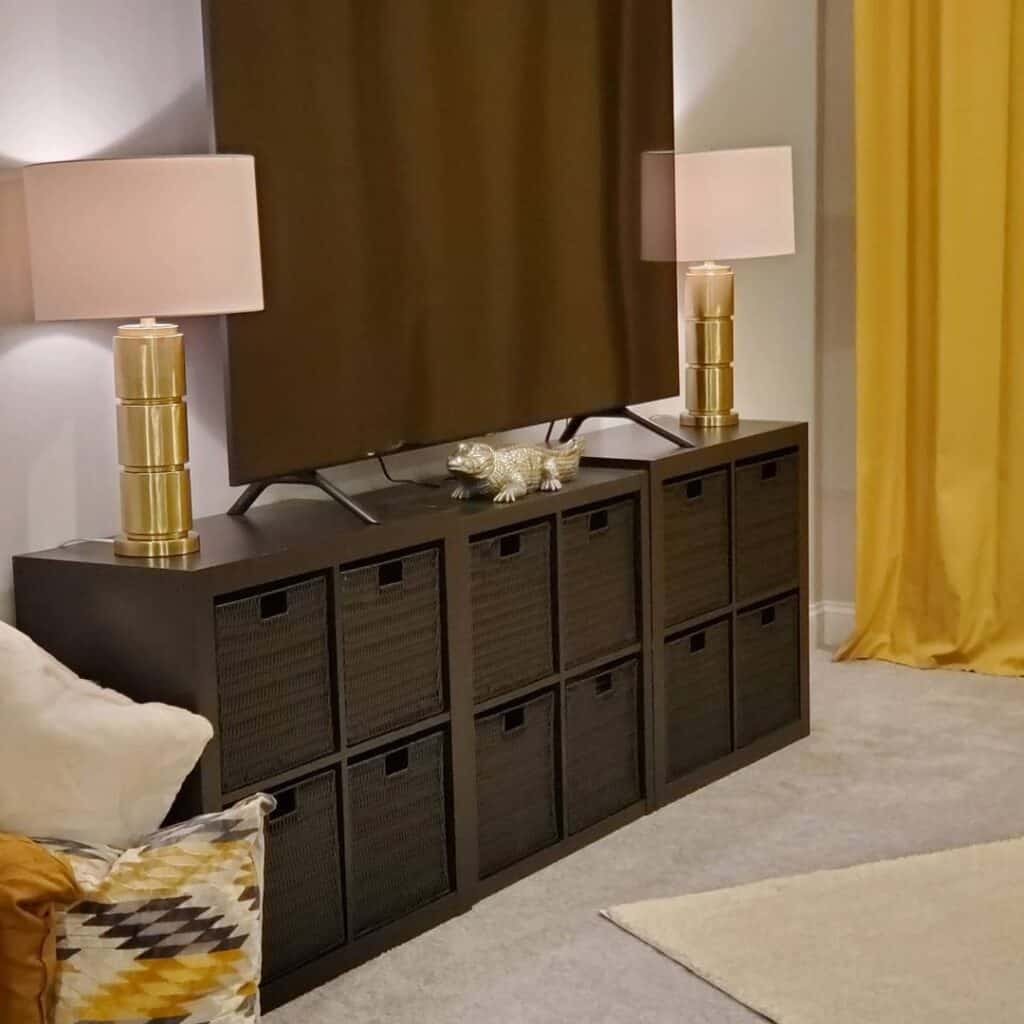 Gold and Beige Lamps on Media Console