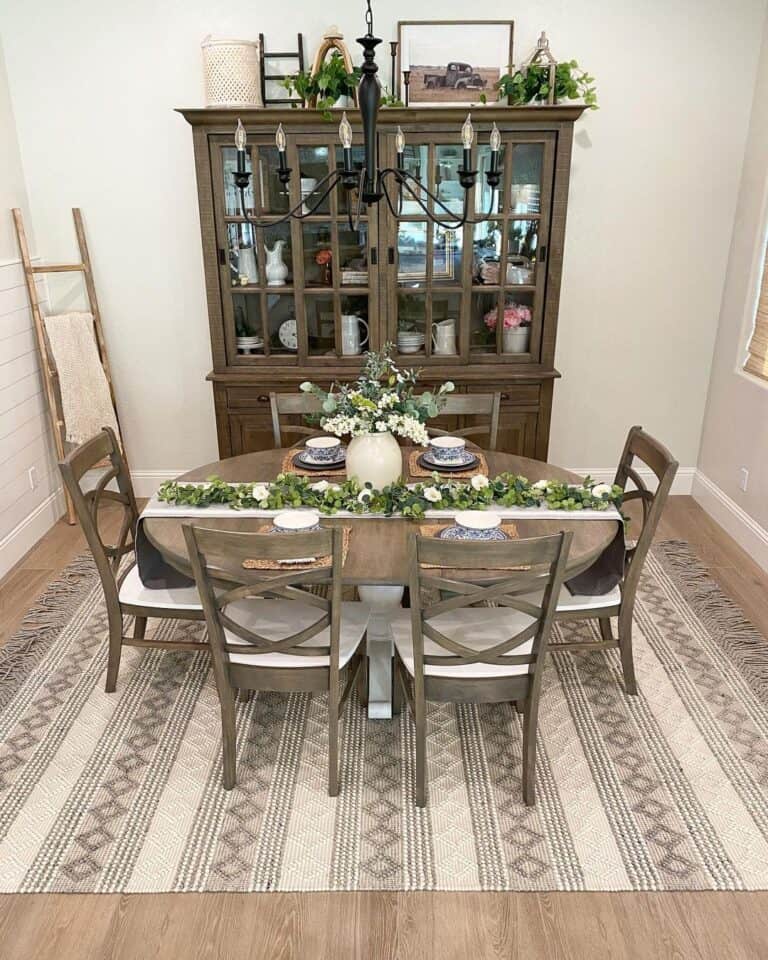Gray Dining Room with Dark Wood Hutch