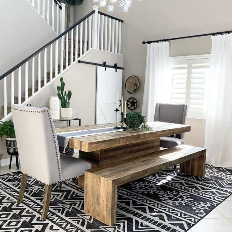 Gray Dining Room with Stained Wood Pedestal Table
