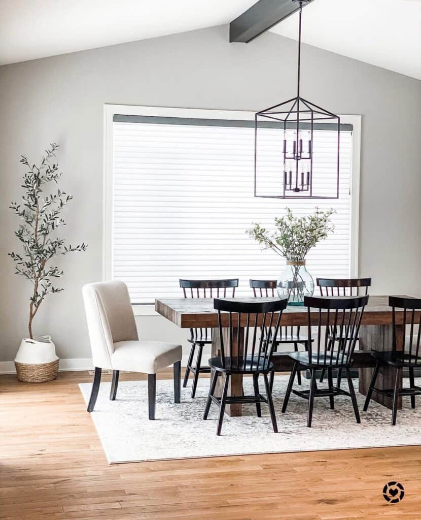Gray Farmhouse Dining Room with Sloped Ceilings