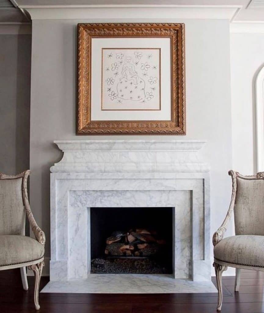 Ornate Gold Frame Art Above Fireplace