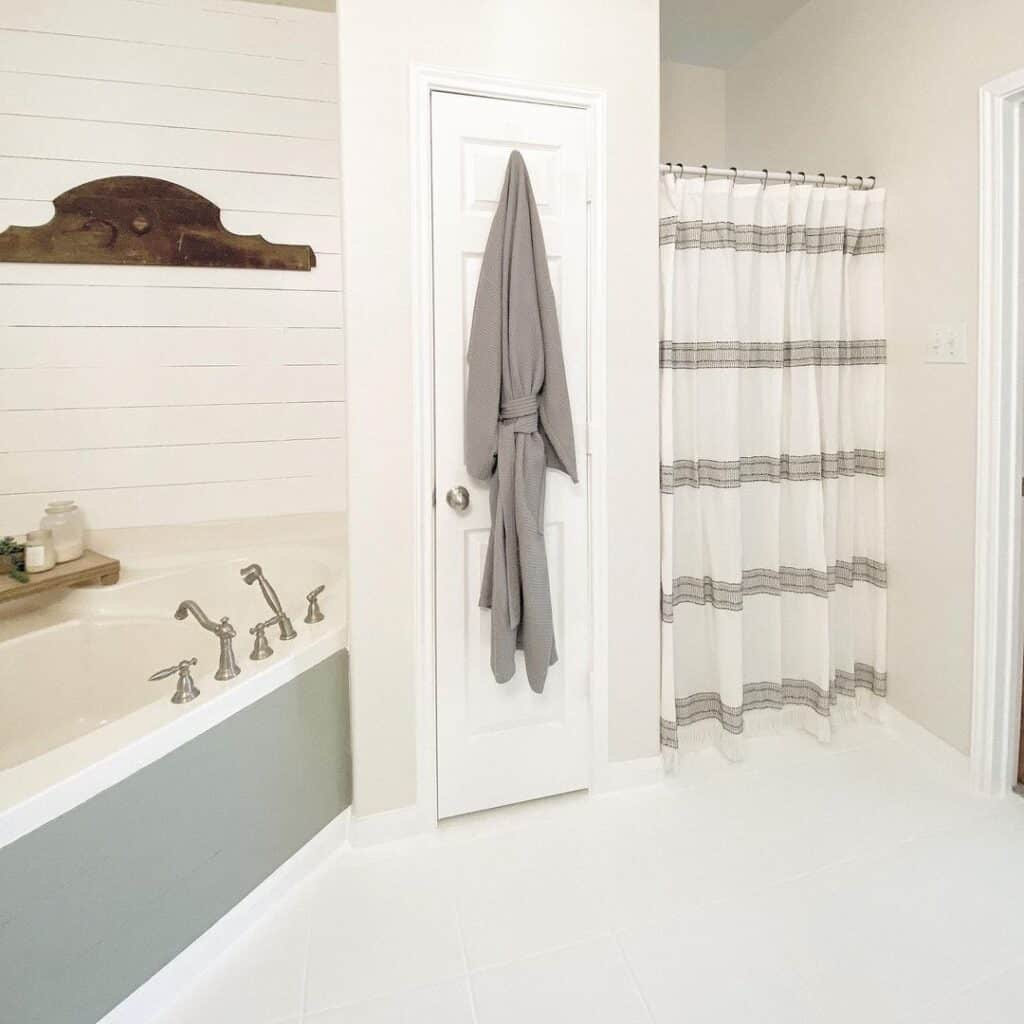 Shower Stall with White and Gray Fringe Curtain