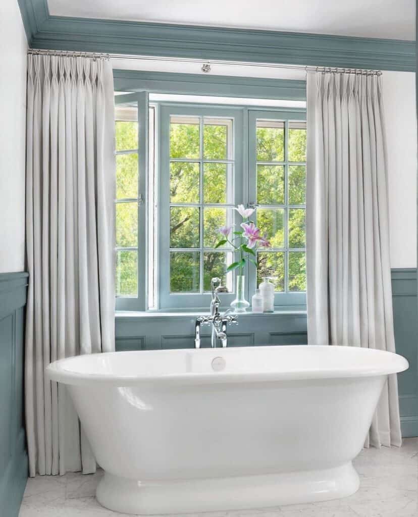 Teal Bathroom Windows with Light Gray Curtains
