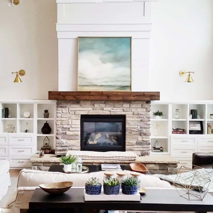 Turquoise and White Artwork on Fireplace Mantel