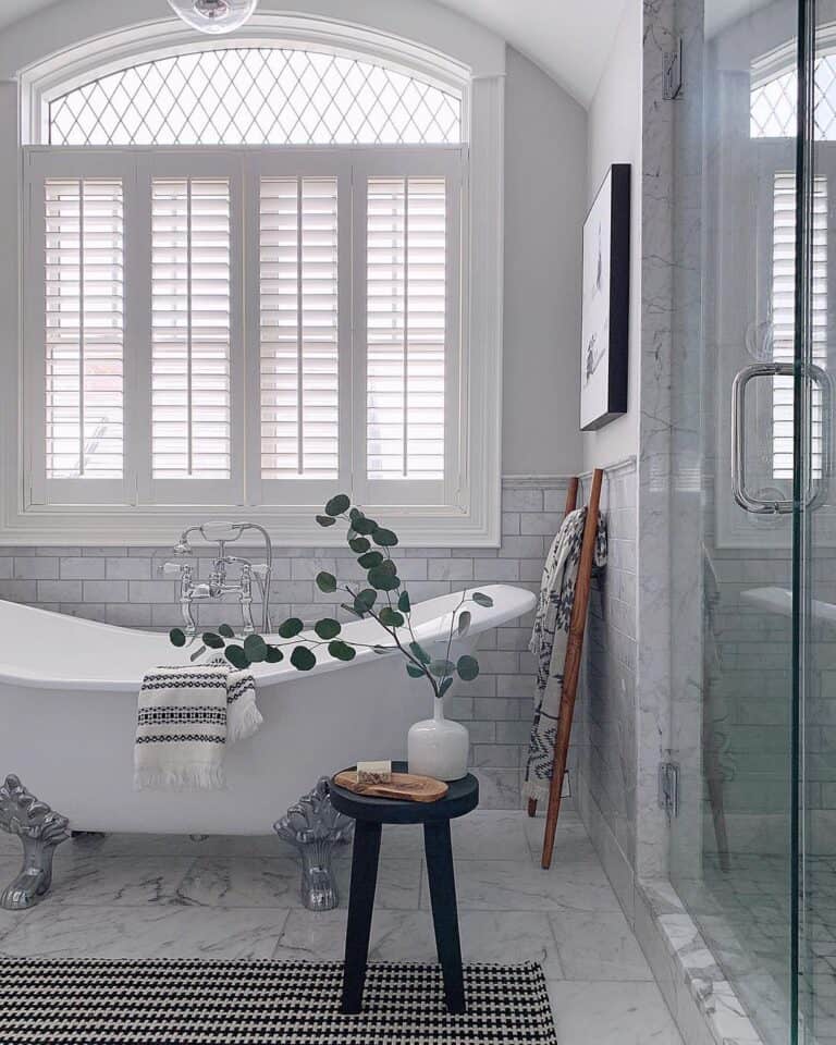 White Arched Lattice Window with Shutters