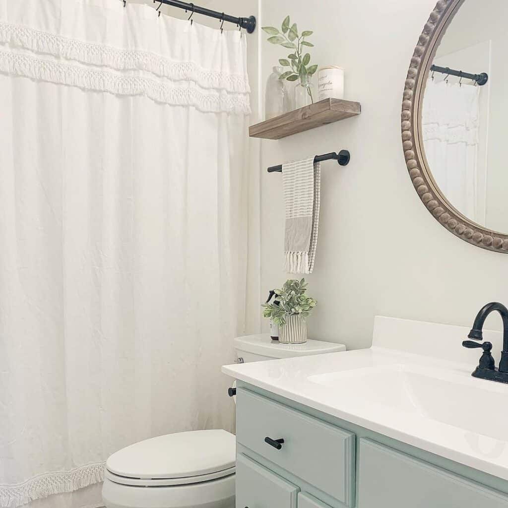 White Bathroom with White Fringe Shower Curtain