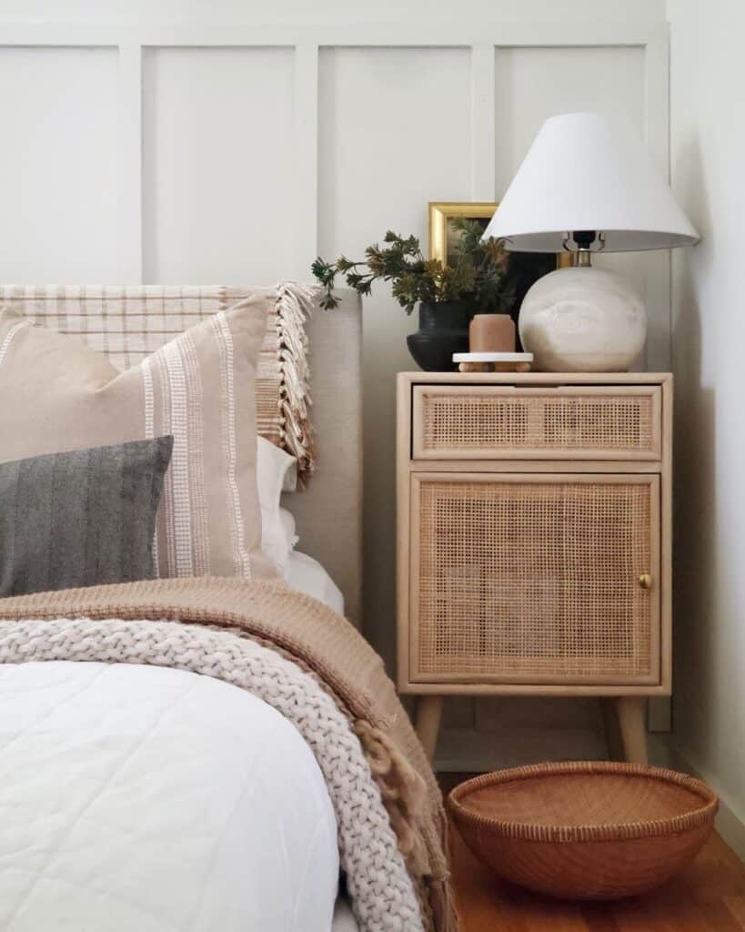 White Bedside Lamp on Woven Side Table