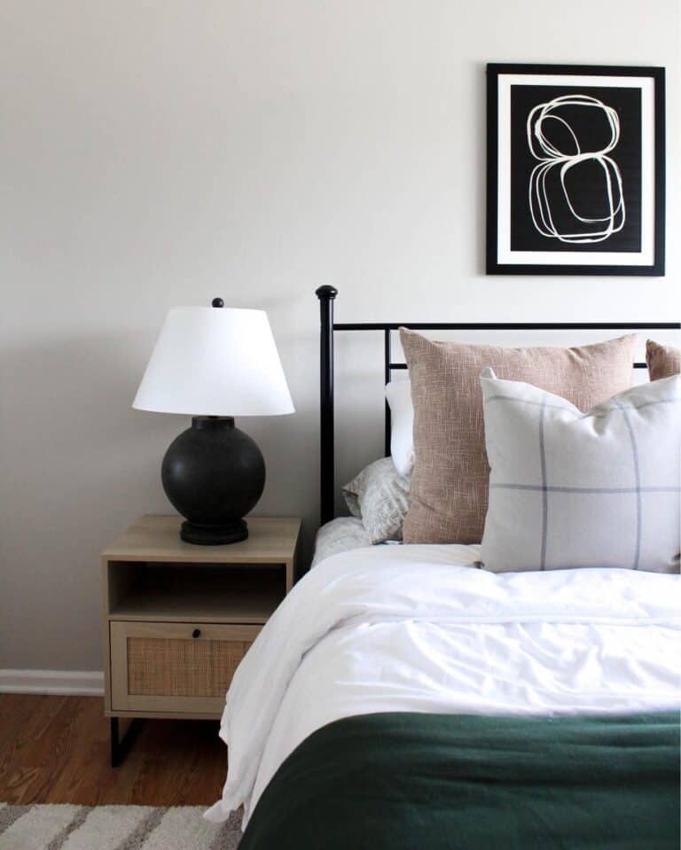 White and Black Bedroom Lamp on Bedside Table