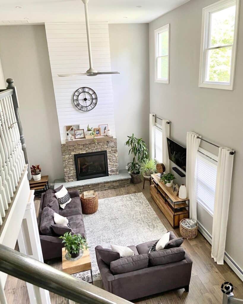 2 Story Stone and White Shiplap Fireplace