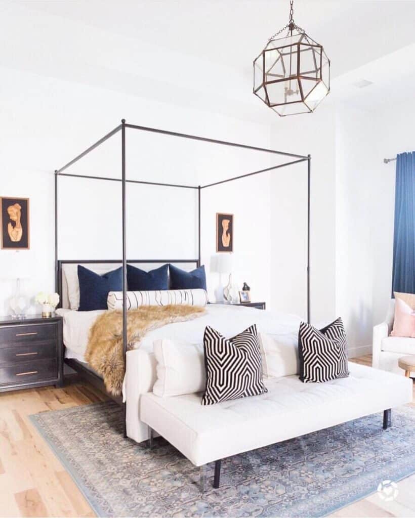 Bedroom with Black Queen Canopy Bed